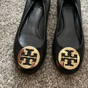 Tory Burch flats. These shoes are in excellent condition.